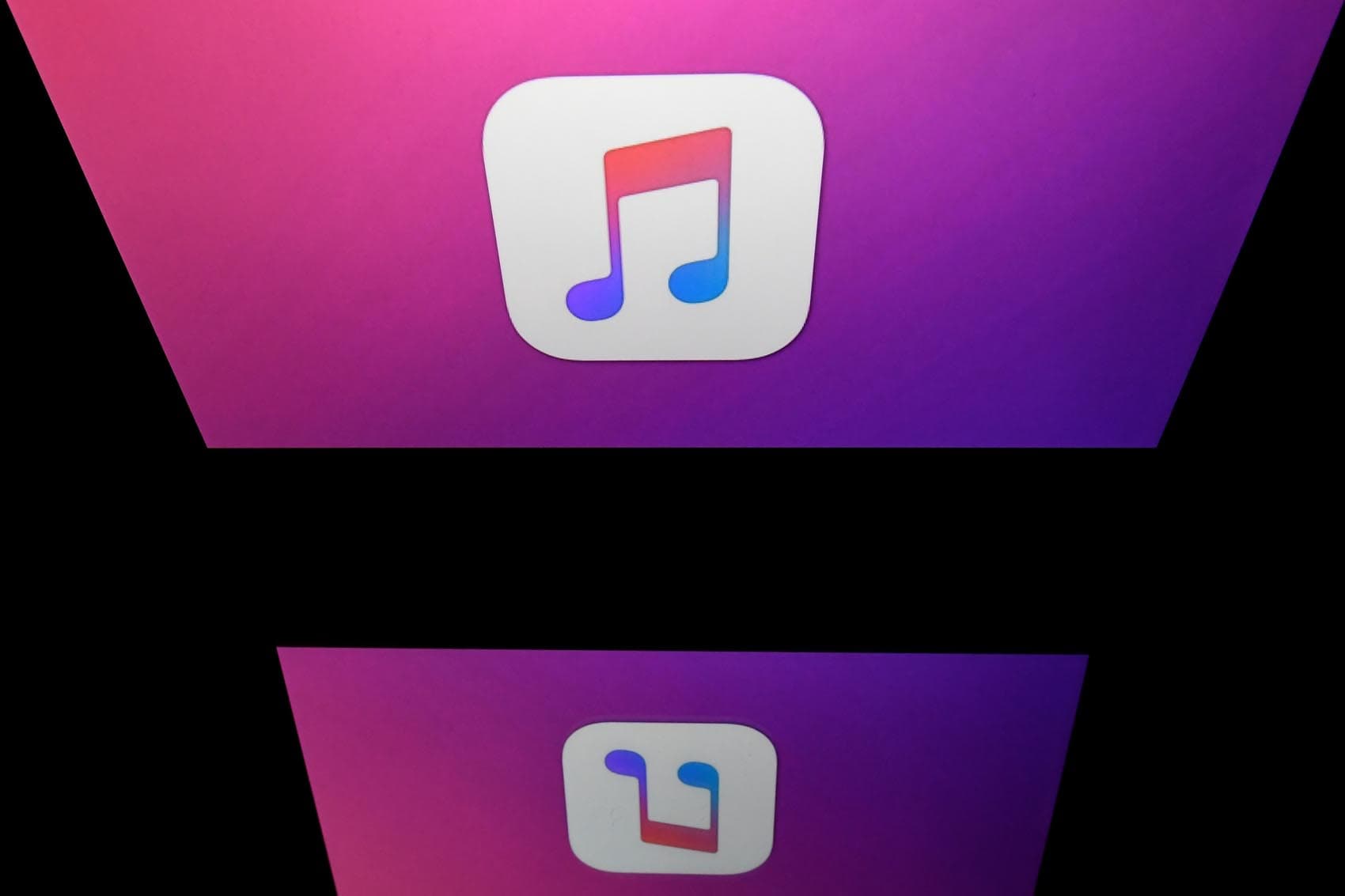 This illustration picture taken on April 19, 2018 shows the logo of the Itunes app of Apple displayed on a tablet screen in Paris. (Lionel Bonaventure/AFP/Getty Images)