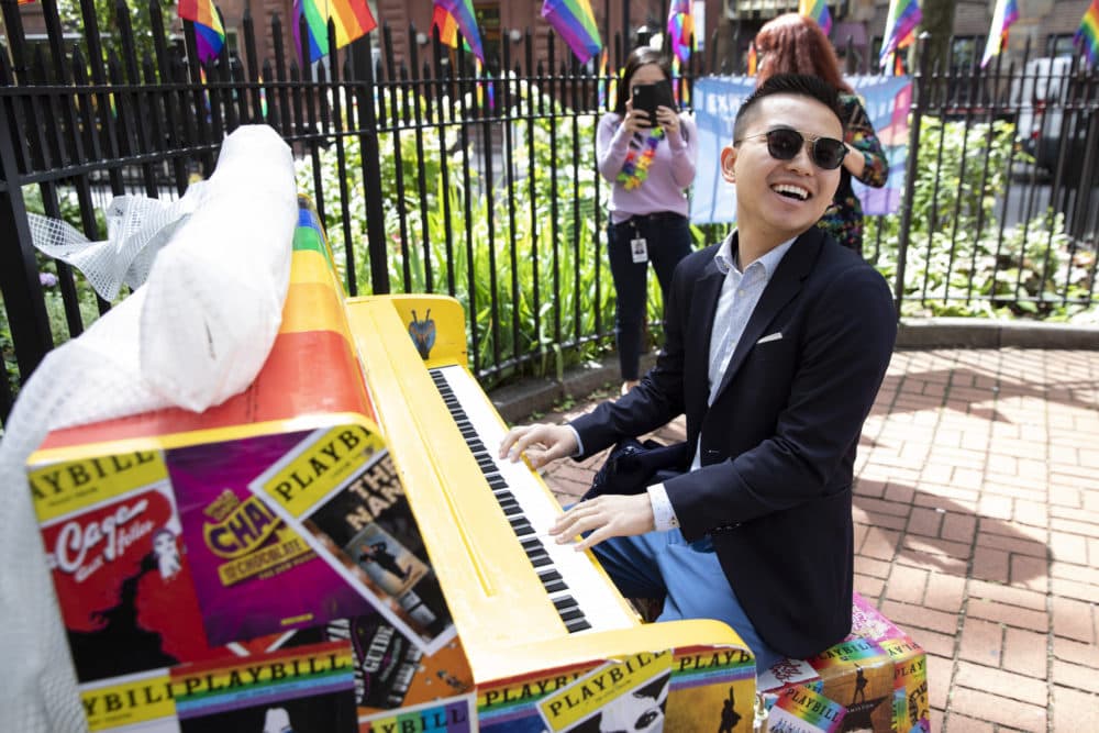 EY employees playing the piano next to the Gay Liberation Monument and in front of The Stonewall Inn on Wednesday, June 12, 2019 in New York. (Ann-Sophie Fjellø-Jensen/AP Images for EY)