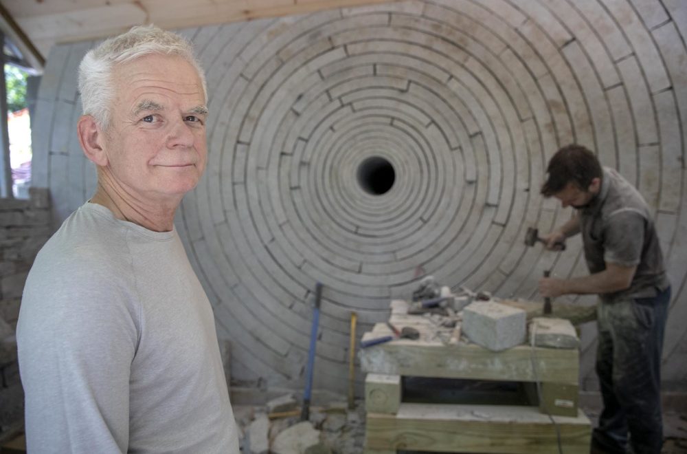 Artist Andy Goldsworthy during the construction of Watershed at deCordova Sculpture Park and Museum. (Robin Lubbock/WBUR)