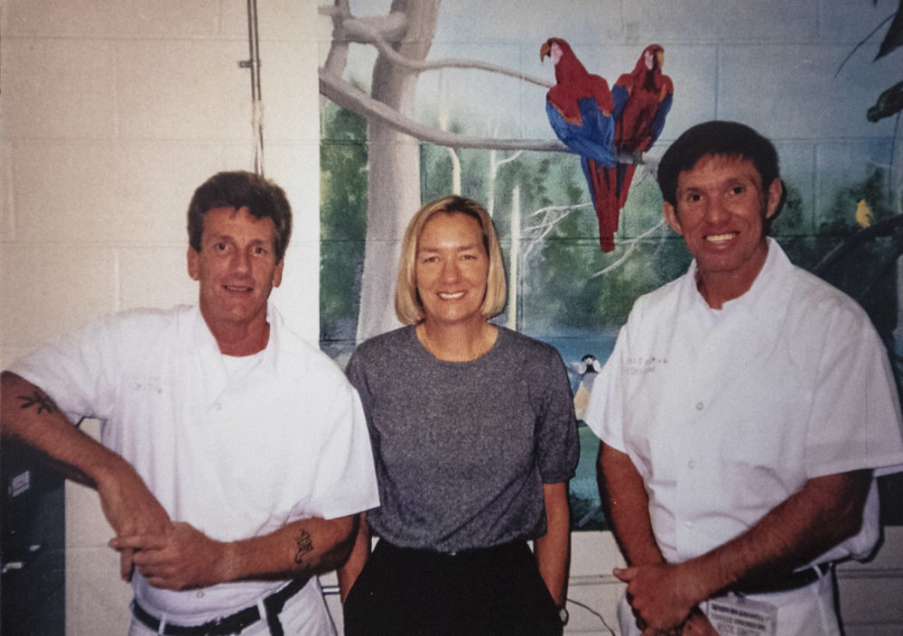 Jenny Phillips, center, poses in a photograph with Rick Smith, left, and Grady Bankhead, prison inmates at Donaldson Correction Facility and subjects in her documentary film &quot;The Dhamma Brothers.&quot; (Courtesy Frank Phillips)