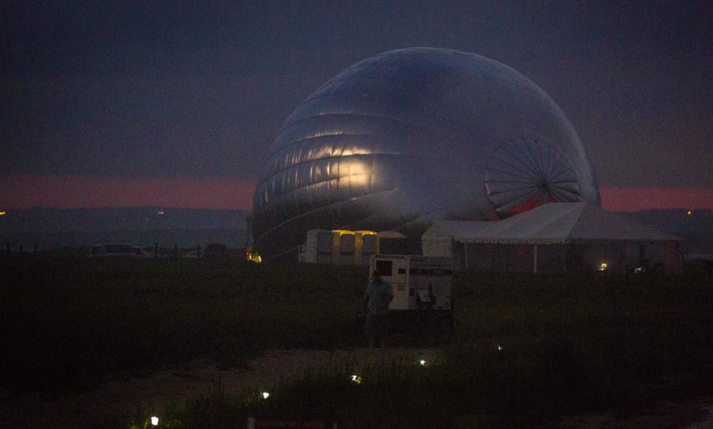 The New Horizon balloon begins to inflate on the beach at Long Point in Martha's Vineyard. (Robin Lubbock/WBUR)