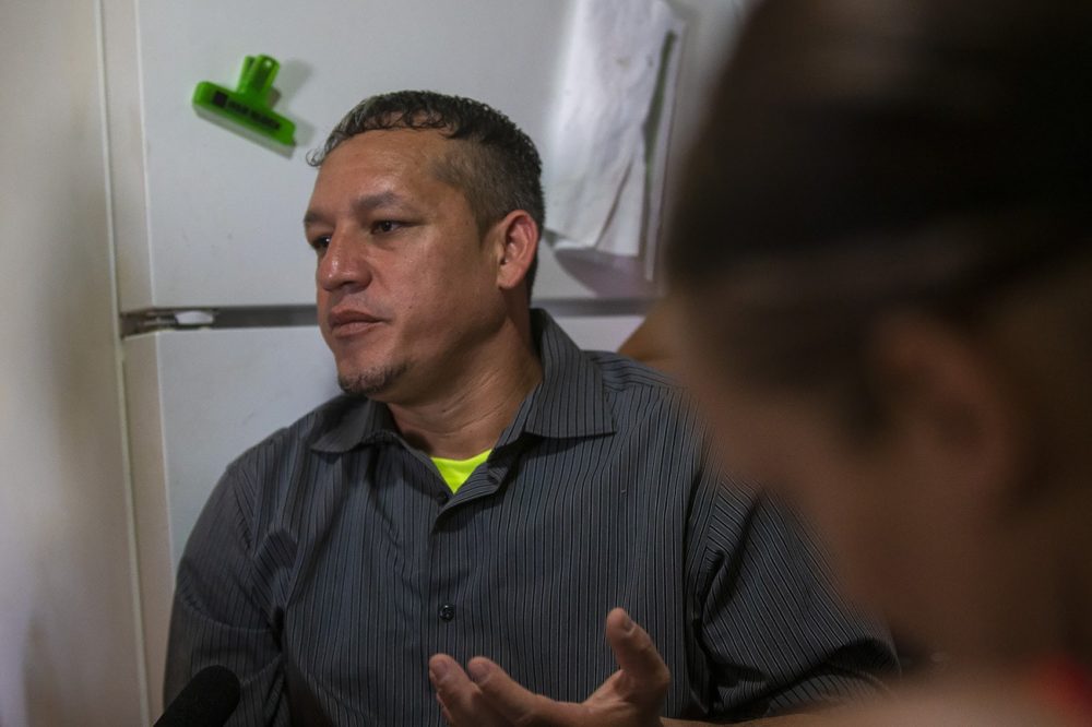 Gilberto Pereira Brito describes his experience in ICE detention. (Jesse Costa/WBUR)