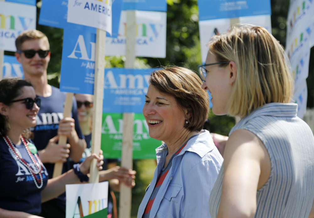 Democratic presidential candidate Sen. Amy Klobuchar, D-Minn., smiles as she talks to her supporters during the Fourth of July Parade in Amherst, N.H.. (Mary Schwalm/AP)