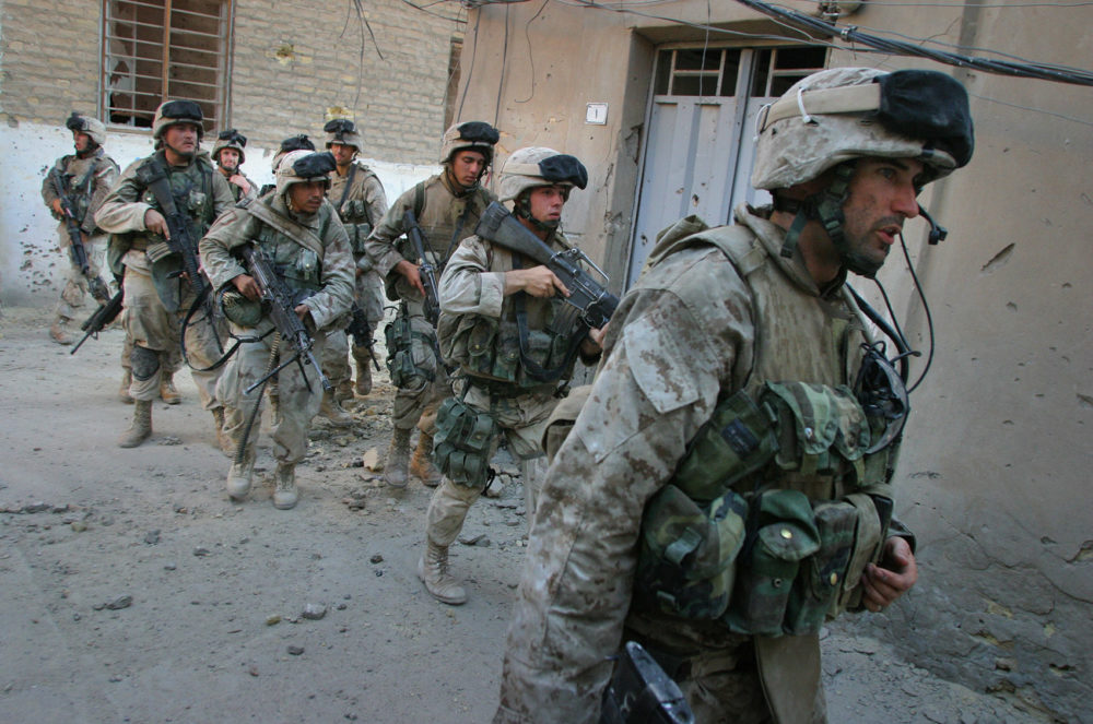 Seth Moulton, right, is seen with fellow Marines on the first day of the August 2004 Battle of Najaf. Moulton served four tours in Iraq. (Courtesy of Lucian Read)