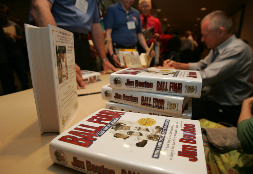 Author Jim Bouton signs his book "Ball Four," at the Society for American Baseball Research (SABR) annual convention in downtown Seattle on Friday, June 30, 2006. (Kevin P. Casey/AP)