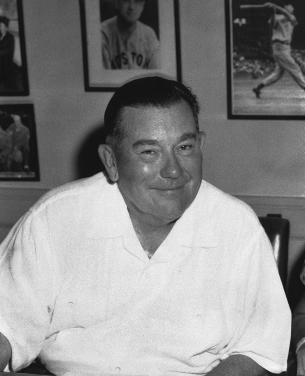 Tom Yawkey, the owner of the Boston Red Sox, sits in his Fenway Park office in Boston in August 1955. (Frank C. Curtin/AP)