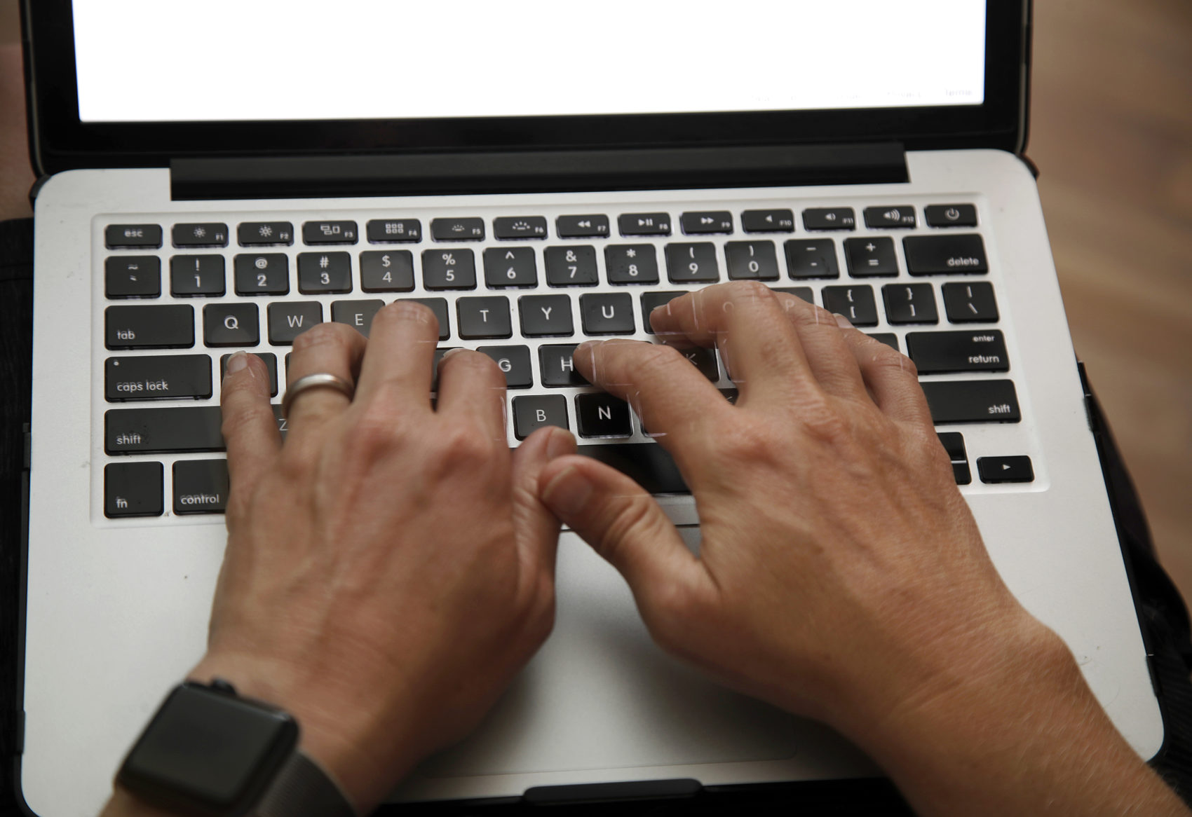 “Research is showing us the best option is for roughly three days to work from home and then you allow two days in the office,” says Scott Mautz, a former executive at Procter and Gamble. (Elise Amendola/AP/File)