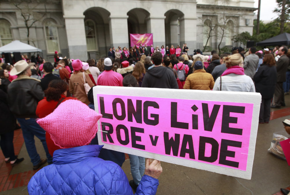 A sign is shown supporting Roe v. Wade at a rally, held by Planned Parenthood, commemorating the 45th anniversary of the landmark Supreme Court decision at the Capitol Monday, Jan. 22, 2018, in Sacramento, California. (AP Photo/Rich Pedroncelli)