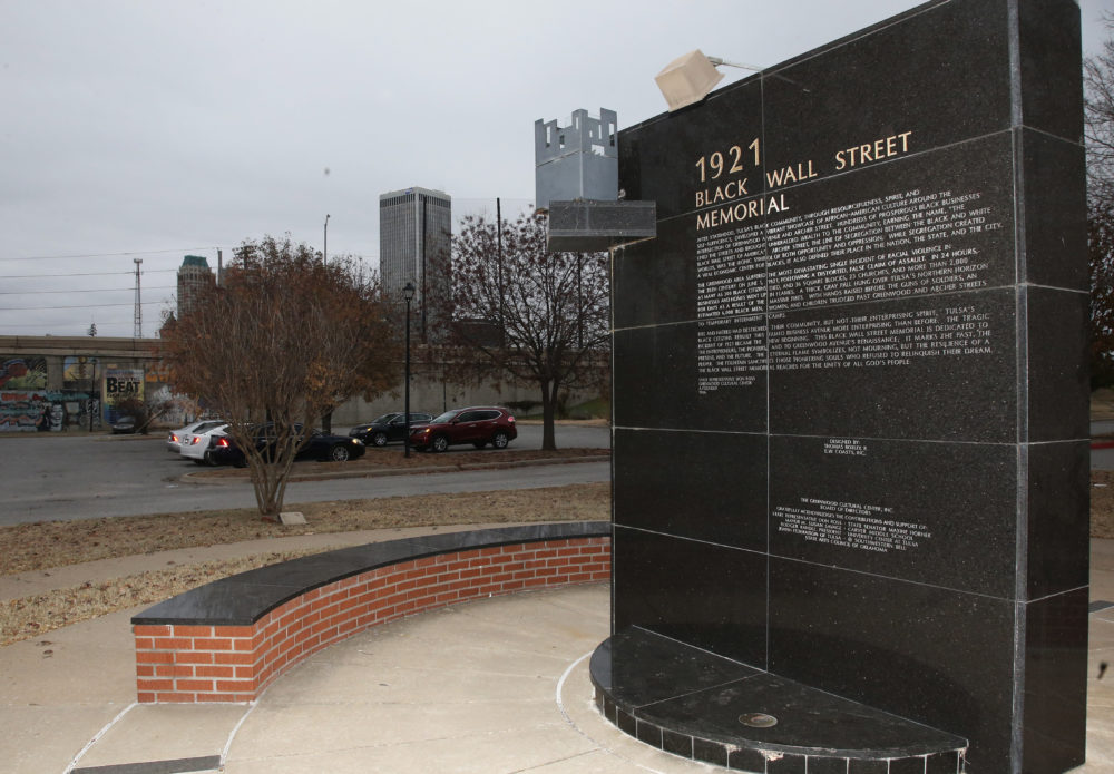 A memorial to Tulsa's Black Wall Street sits outside the Greenwood Cultural Center on the outskirts of downtown Tulsa, Okla. (Sue Ogrocki/AP/File)