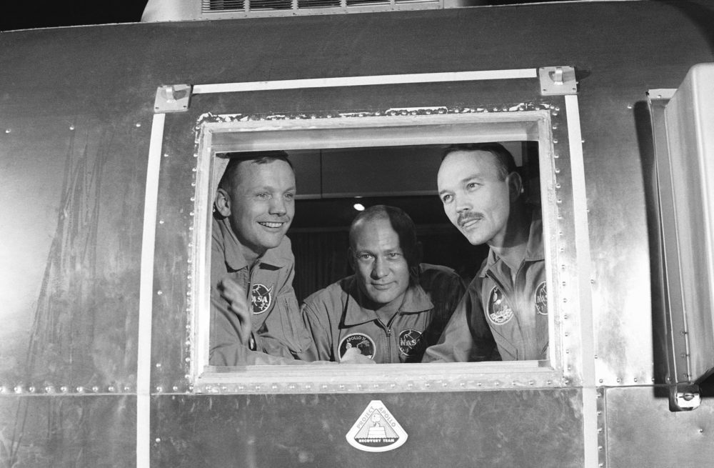 On July 27, 1969, Apollo 11 crew members, from left, Neil Armstrong, Buzz Aldrin and Michael Collins sit inside a quarantine van in Houston. (AP)