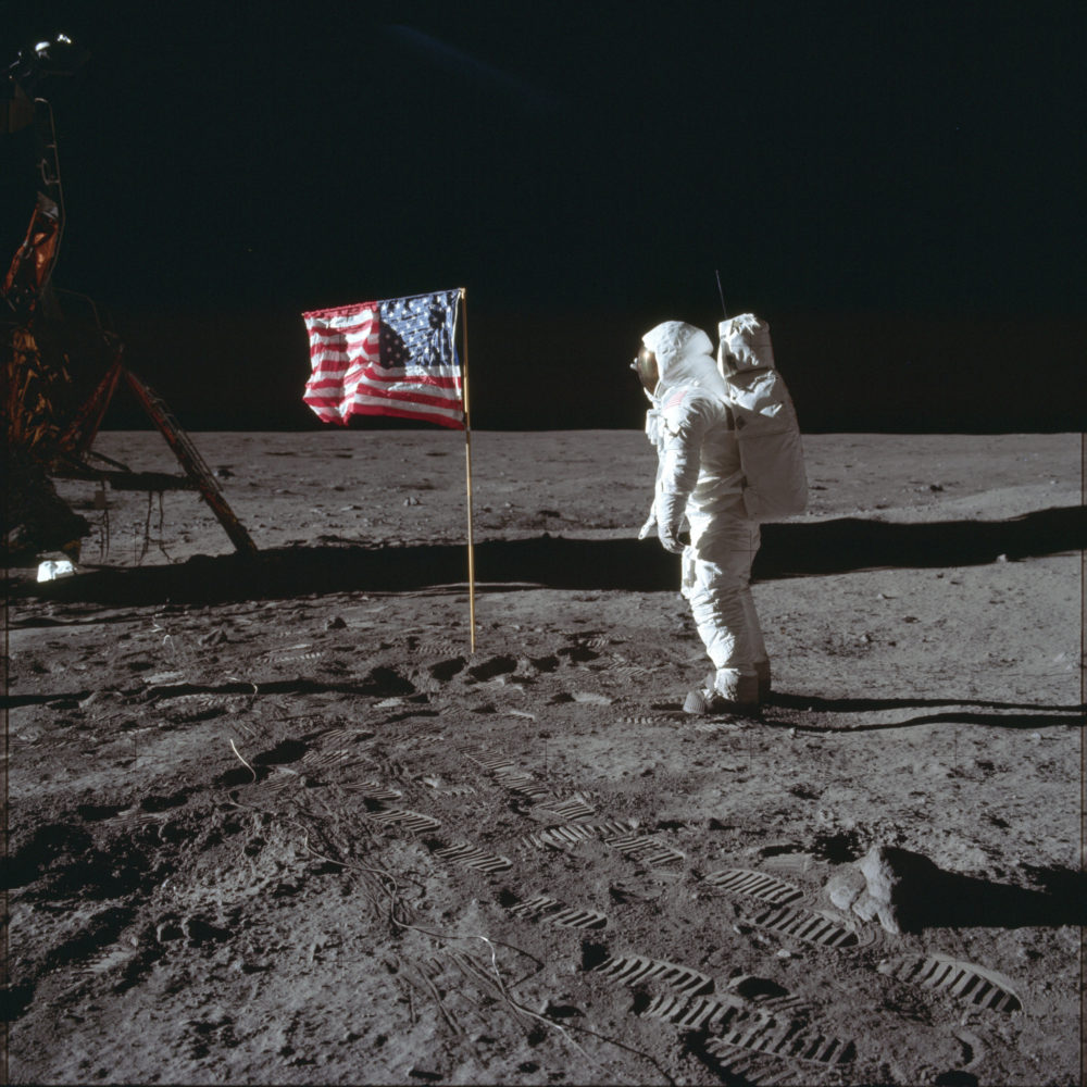 Astronaut Buzz Aldrin poses for a photograph beside the U.S. flag on the moon. (Neil Armstrong/NASA via AP)