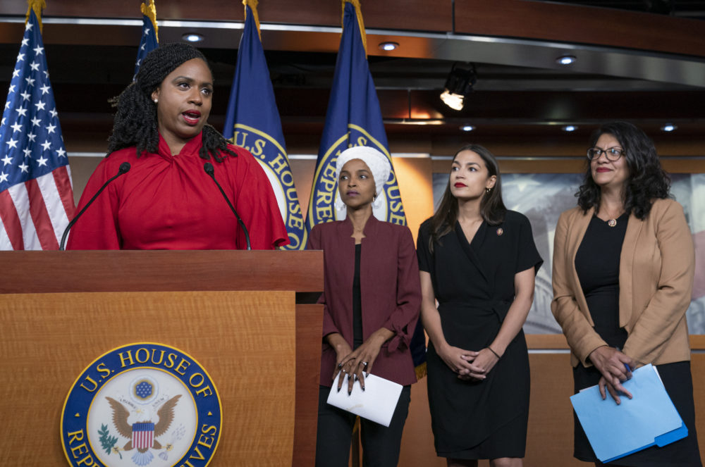 From left: Reps. Ayanna Pressley, D-Mass., llhan Omar, D-Minn., Alexandria Ocasio-Cortez, D-N.Y., and Rashida Tlaib, D-Mich., respond to remarks by President Trump Monday evening in Washington. (J. Scott Applewhite/AP)