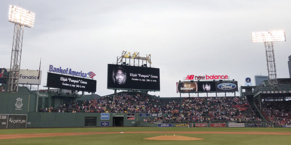 Fans stand for a moment of silence dedicated to Boston Red Sox great Elijah &quot;Pumpsie&quot; Green, the team's first black player who passed away earlier in the day, prior to a baseball game between the Boston Red Sox and Toronto Blue Jays at Fenway Park in Boston, July 17, 2019. (Charles Krupa/AP)