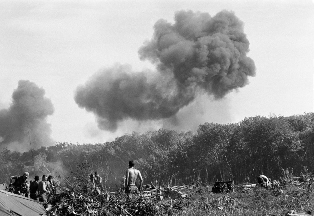 U.S. Army helicopters bomb Viet Cong positions near the Cambodian border about 80 miles north of Saigon, Dec. 6, 1967. (Horst Faas/AP)