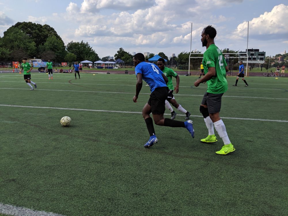 The Boston Unity Cup brings together players from the area that represent more than 20 countries. Here, the Cape Verde and Sudan (green) men's teams fight for the ball in the men's final. (Courtesy of Boston Unity Cup)