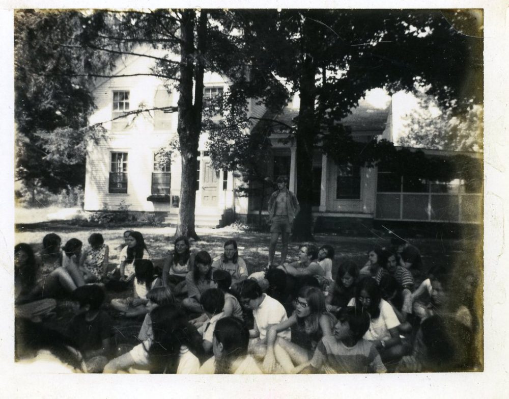 In this 1969 photo, Circle Pines Center campers and counselors (including the author, wearing a white blouse, head tilted, back row) gather on the farmhouse lawn from where they’d watch the moon landing. (Courtesy)