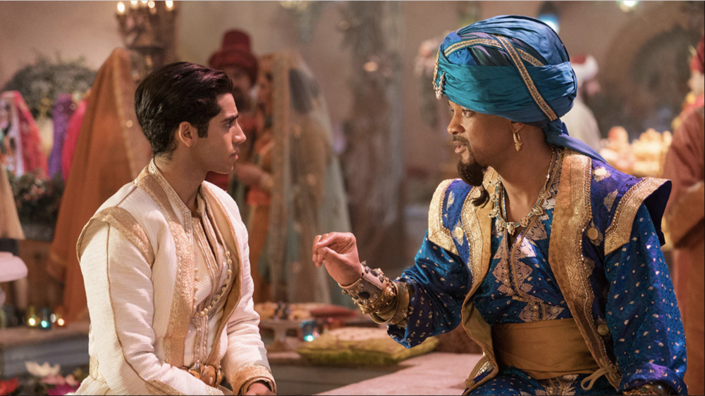Mena Massoud as Aladdin and Will Smith as Genie in the live-action remake of &quot;Aladdin.&quot; (Courtesy Disney Enterprises, Inc.)