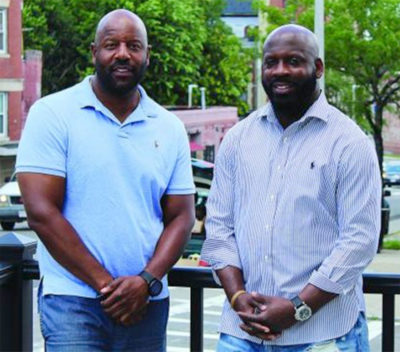 Kobie Evans, left, and Kevin Hart are partners in Pure Oasis, which is set to be the city of Boston's first recreational marijuana shop. (Courtesy of Mike Whittaker)