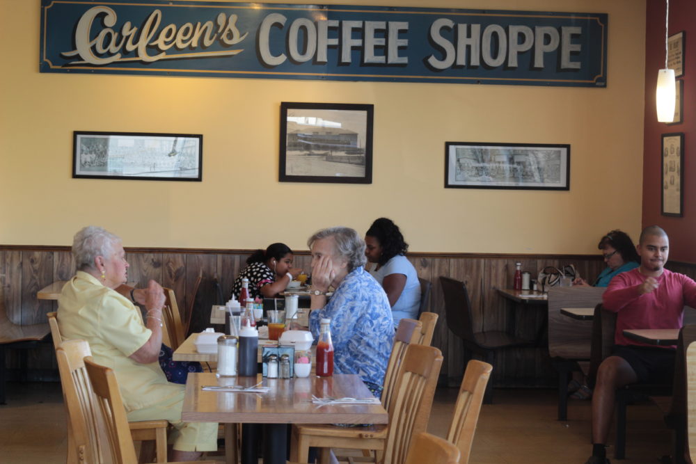 Patrons sit inside Carleen's Coffee Shoppe on Tuesday. (Quincy Walters/WBUR)