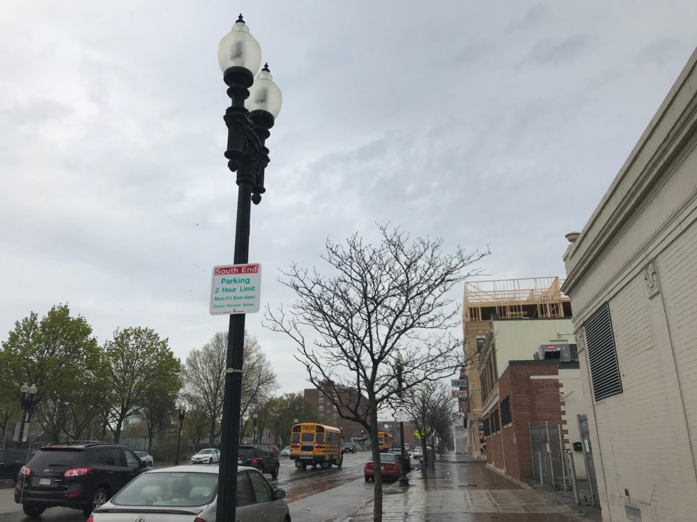 South End parking signs on Washington Street, across from the Residence Inn. (Miranda Suarez/WBUR)