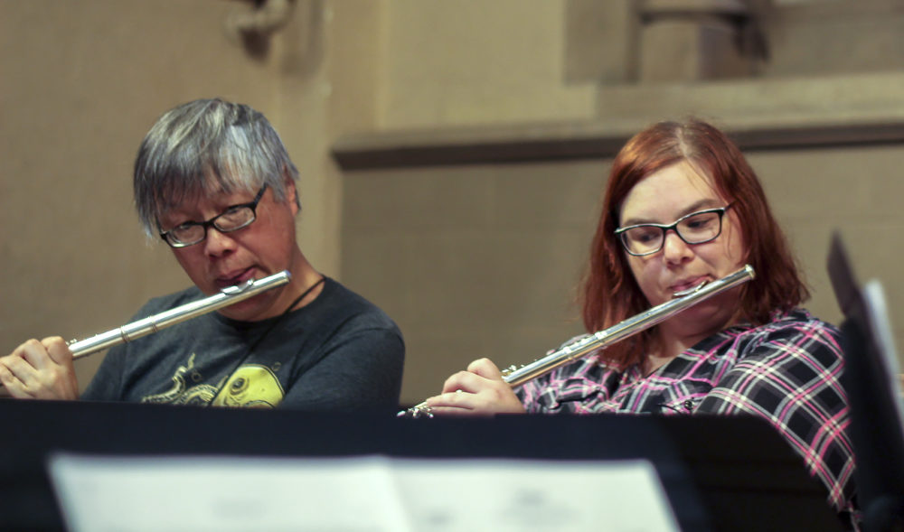 Flute-players Alex Wei, left, and Sarah Hicks play during the first session of Bach Breaks. (Quincy Walters/WBUR)