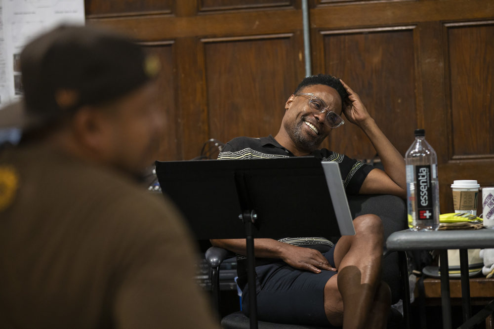 Director Billy Porter laughs during a rehearsal of the opening scene of &quot;The Purists&quot; at the Huntington Theater. (Jesse Costa/WBUR)