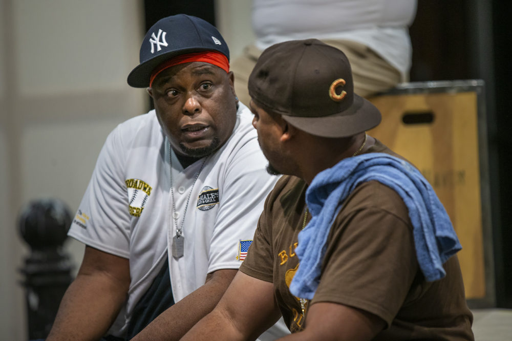 J. Bernard Calloway as Mr. Bugz (left) and Morocco Omari as Lamont rehearse a scene of &quot;The Purists.&quot; (Jesse Costa/WBUR)