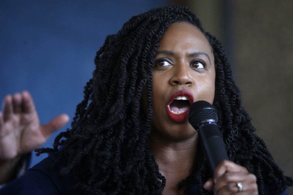 U.S. Rep. Ayanna Pressley, D-Mass., addresses a crowd during an event in Boston on July 21. (Steven Senne/AP)