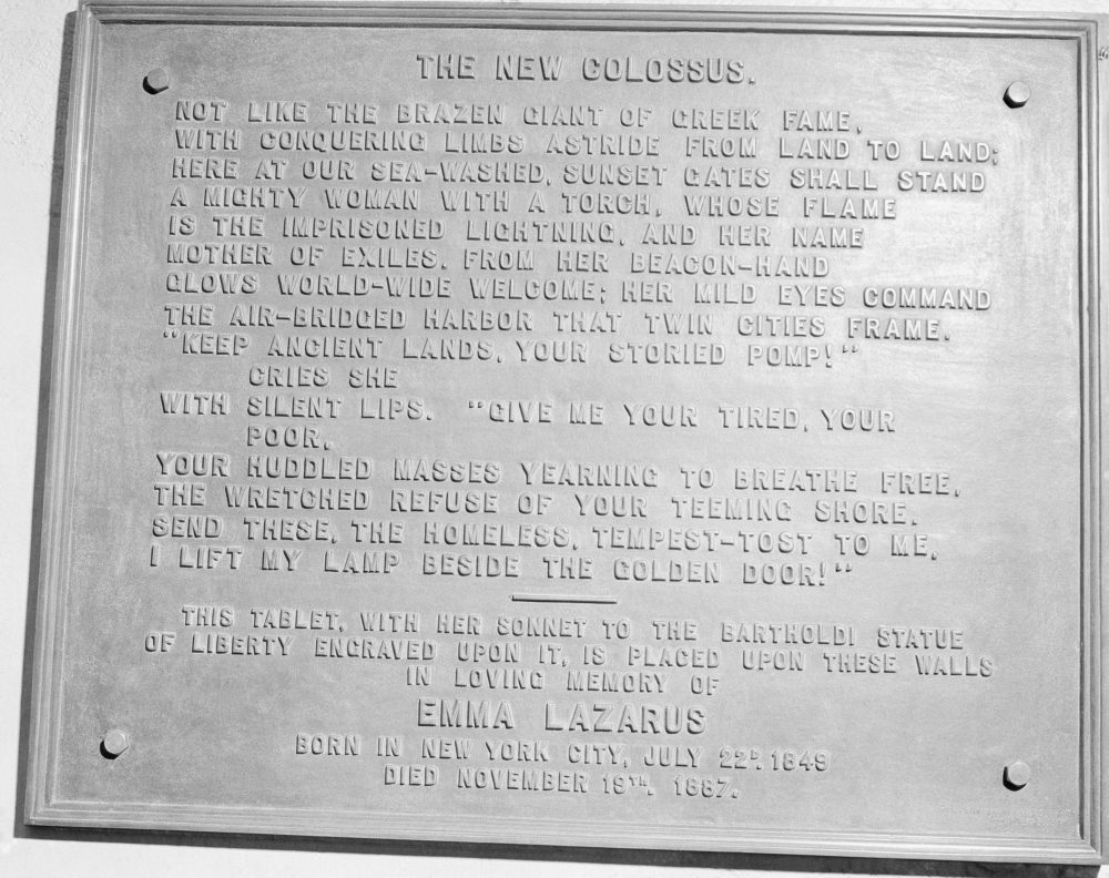 This circa 1950 photo shows a bronze plaque of the poem by Poet Emma Lazurus on Statue of Liberty in New York. (AP)