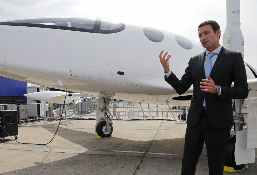 Omer Bar-Yohay, Eviation CEO and co-founder, gestures as he speaks to media next to an Alice electric aircraft at the Paris Air Show on June 18. (Michel Euler/AP)