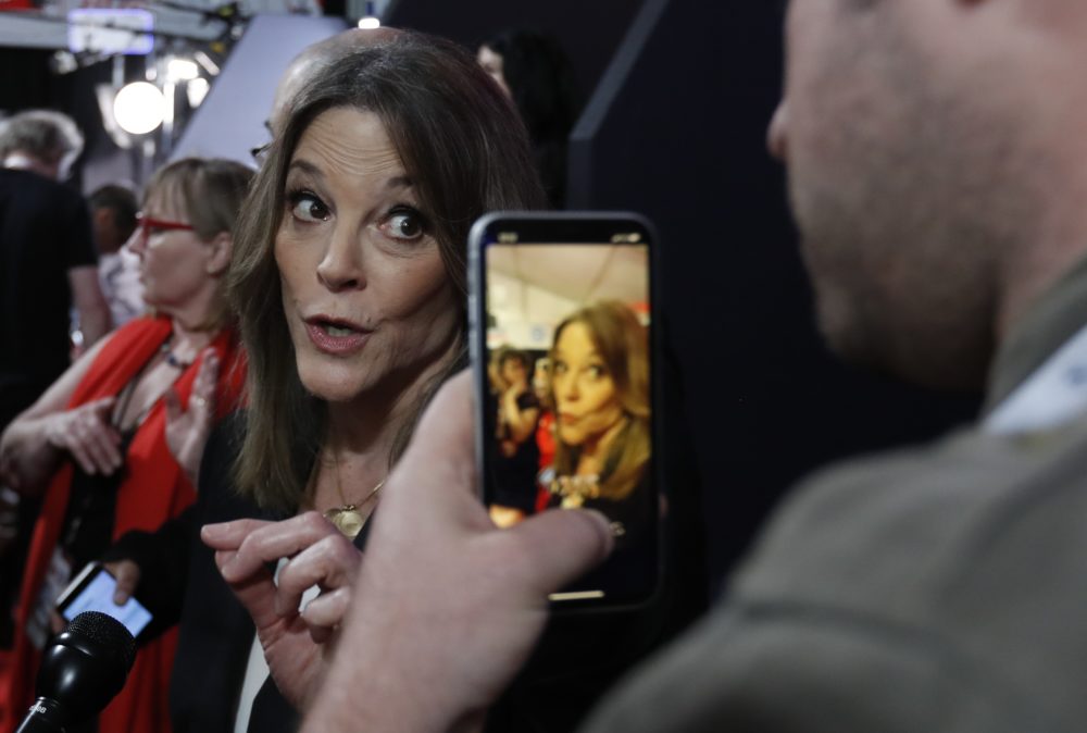 Marianne Williamson talks to reporters after the first of two Democratic presidential primary debates hosted by CNN Tuesday, July 30, 2019, in the Fox Theatre in Detroit. (Carlos Osorio/AP)