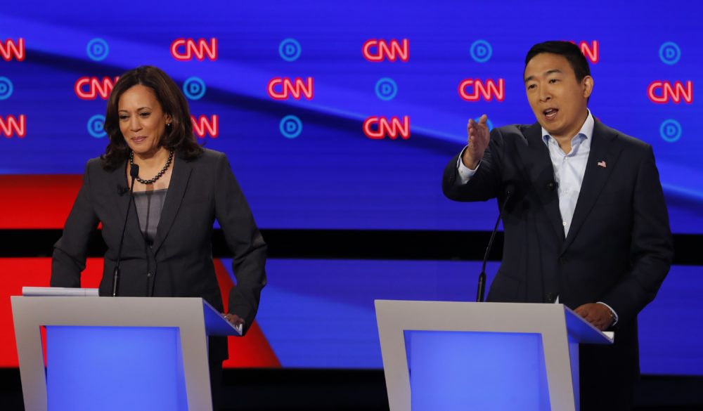 Sen. Kamala Harris, D-Calif., listens as Andrew Yang speaks during the second of two Democratic presidential primary debates hosted by CNN Wednesday, July 31, 2019, in the Fox Theatre in Detroit. (Paul Sancya/AP)