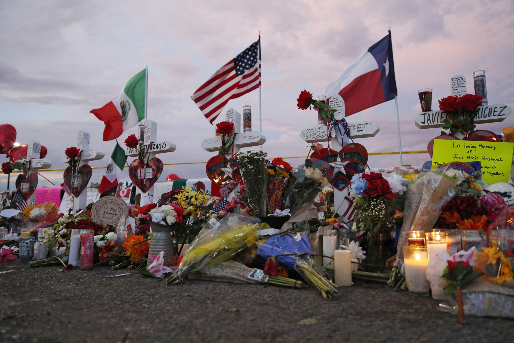 Flags fly over crosses at a makeshift memorial near the scene of a mass shooting at a shopping complex Aug. 6, 2019, in El Paso, Texas. (John Locher/AP)