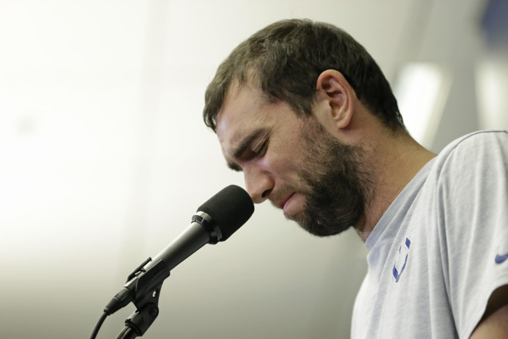 Indianapolis Colts quarterback Andrew Luck speaks during a news conference following the team's NFL preseason game against the Chicago Bears Saturday in Indianapolis. The oft-injured star is retiring at age 29. (AJ Mast/AP)