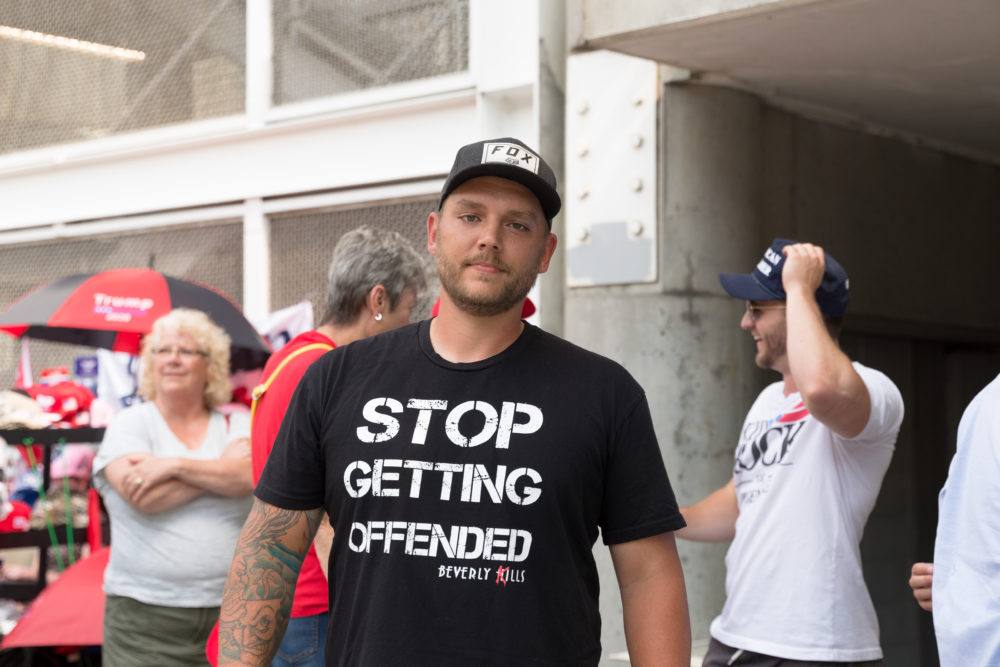 Ronnie Gilbert attended Trump's rally in Cincinnati on Thursday night. He says, "[Trump] is trying to do good for America." (Rachael Banks for Here & Now)