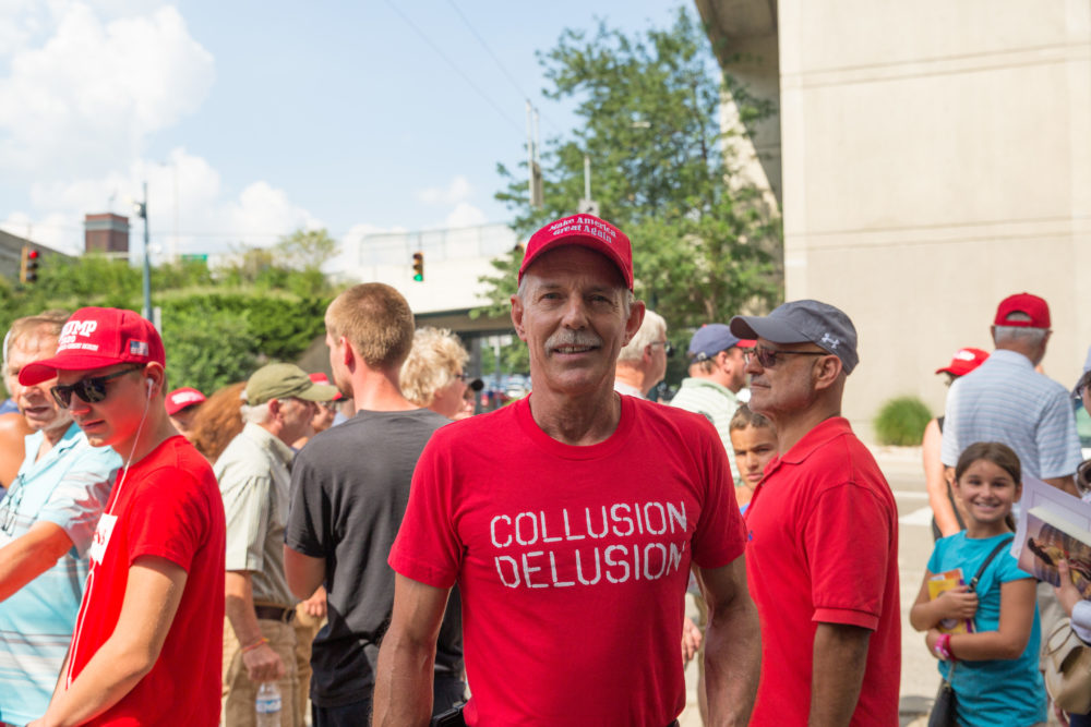 "I think it's a false narrative all the way through," Eric Staeuble said when asked about his shirt that read, "COLLUSION DELUSION." (Rachael Banks for Here & Now)
