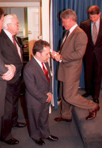 Bill Clinton leaves the podium after announcing on Feb. 7, 1995 that there was still no settlement in the baseball strike. (J. David Ake/AFP/Getty Images)