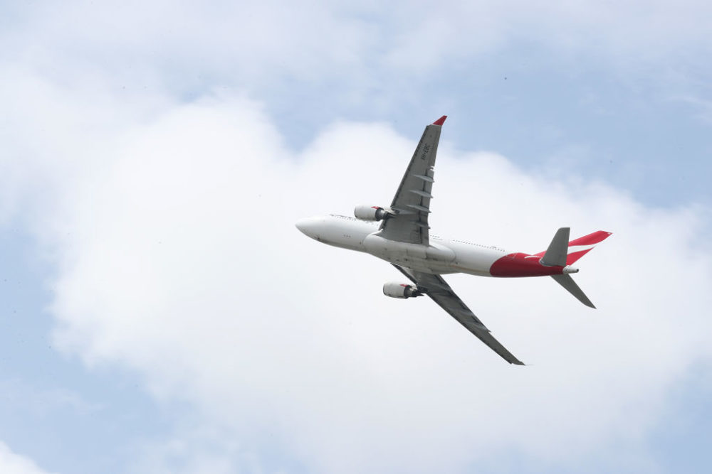 A Qantas commercial plane takes off at Sydney Airport on March 14, 2019 in Sydney, Australia. (Cameron Spencer/Getty Images)