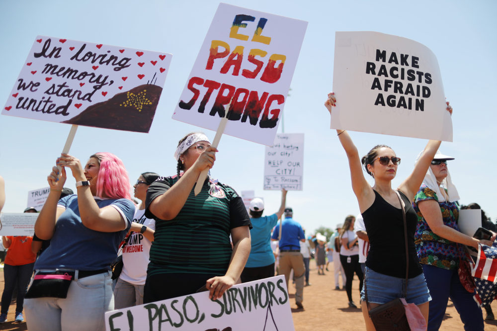 Demonstrators stand at a protest against President Trump's visit following a mass shooting, which left at least 22 people dead, on August 7, 2019 in El Paso, Texas. Protestors also called for gun control and denounced white supremacy. (Mario Tama/Getty Images)
