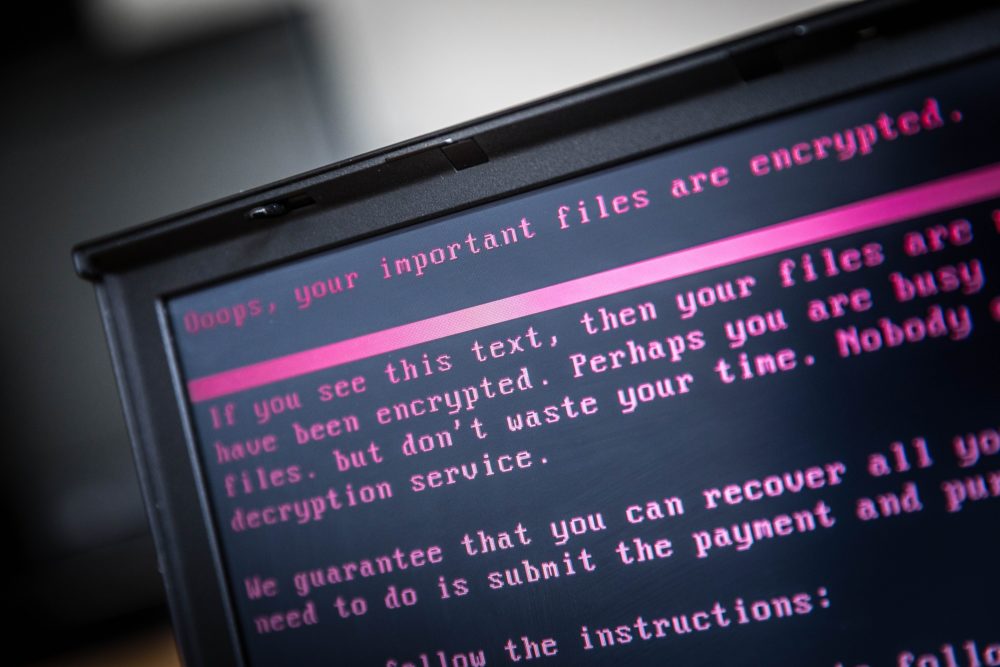 A laptop displays a message after being infected by a ransomware. (Rob Engelaar/AFP/Getty Images)