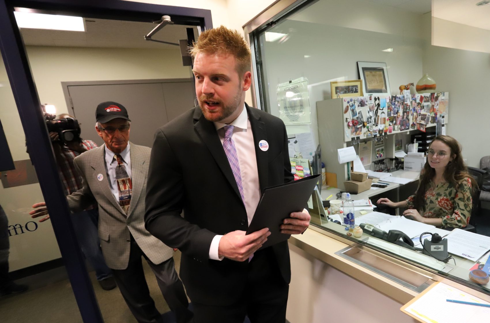 Tommy Hickey, director of the Massachusetts Right to Repair Coalition, walked the first round of paperwork for his group's proposed ballot question into the attorney general's office in August. (Sam Doran/State House News Service)