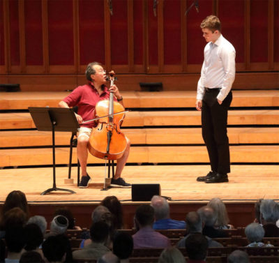 Yo-Yo Ma demonstrates for Tanglewood Music Center cello fellow Isaac Berglind. (Courtesy of Hilary Scott)