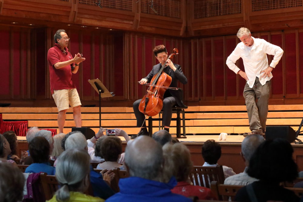 Yo-Yo Ma, Tanglewood Music Center fellow Shangwen Liao, and an audience member explore the Bach Cello Suites. (Courtesy of Hilary Scott)