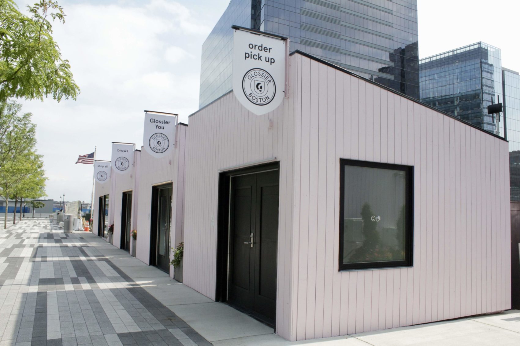 The outside of the Glossier pop-up shop, located at The Current in Boston's Seaport. (Meghan B. Kelly/WBUR)