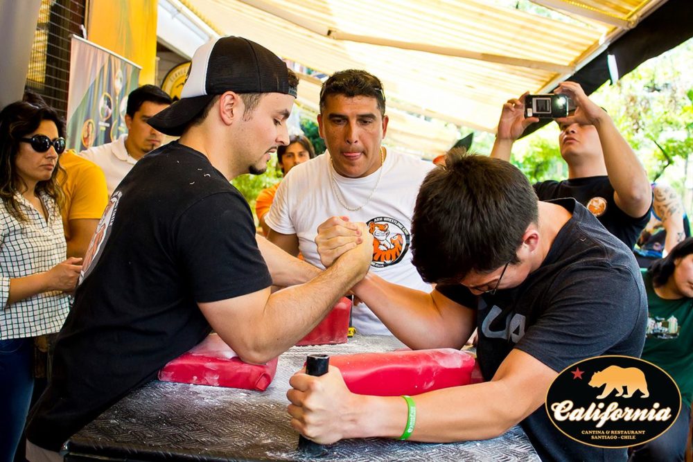 Tomás Silva (left) competes in a tournament he hosted at a bar in his neighborhood. (Courtesy of Tomás Silva)
