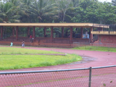 Children play at Bailey Olter High School's (formerly Pohnpei Island Central School) field in Kolonia, Pohnpei Island (courtesy Paul Watson).