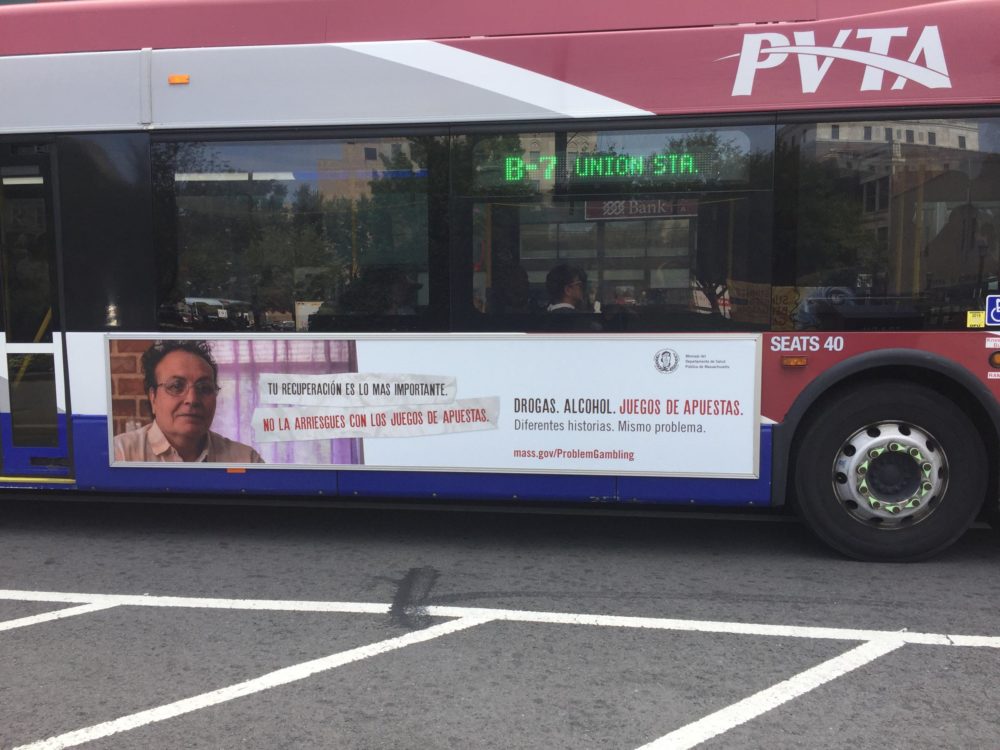 The Massachusetts Department of Public Health has placed ads about problem gambling on buses and social media. (Karen Brown/NEPR)