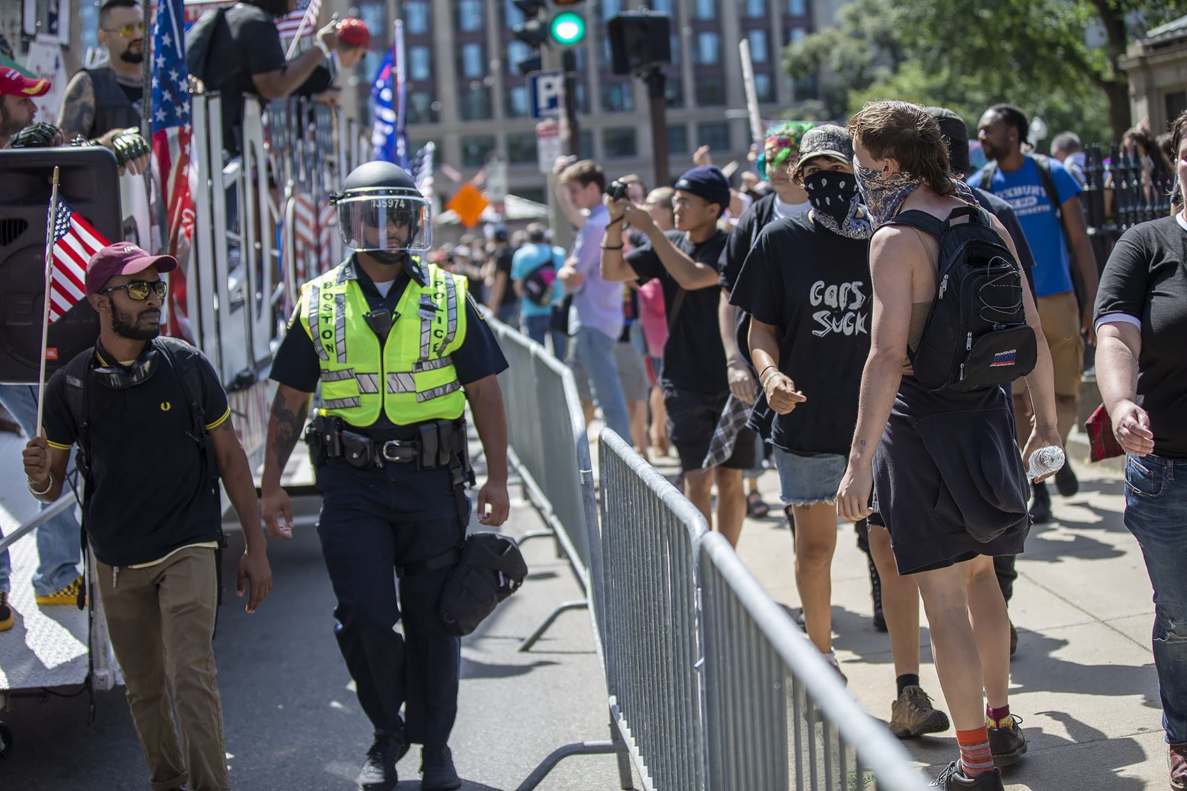 Counter-protesters scream at parade participants and police as they proceed down Tremont Street during the controversial "Straight Pride" parade. (Jesse Costa/WBUR)