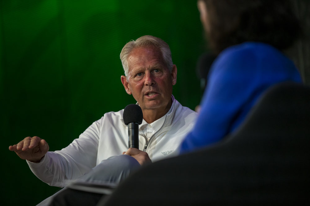 Danny Ainge, Boston Celtics president of basketball operations, speaks with reporter Shira Springer at WBUR’s CitySpace on Friday. (Jesse Costa/WBUR)