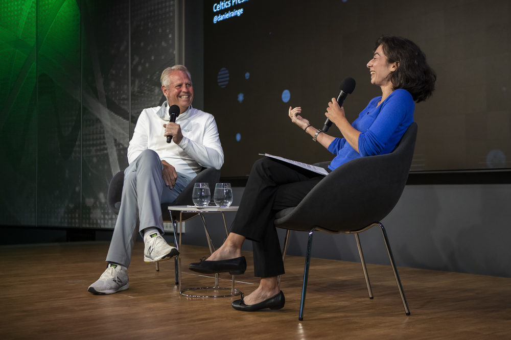 Boston Celtics General Manager and President of Basketball Operations Danny Ainge speaking with WBUR reporter Shira Springer at WBUR’s City Space. (Jesse Costa/WBUR)